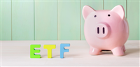 Exchange Traded Funds theme with letters and piggy bank — Photo